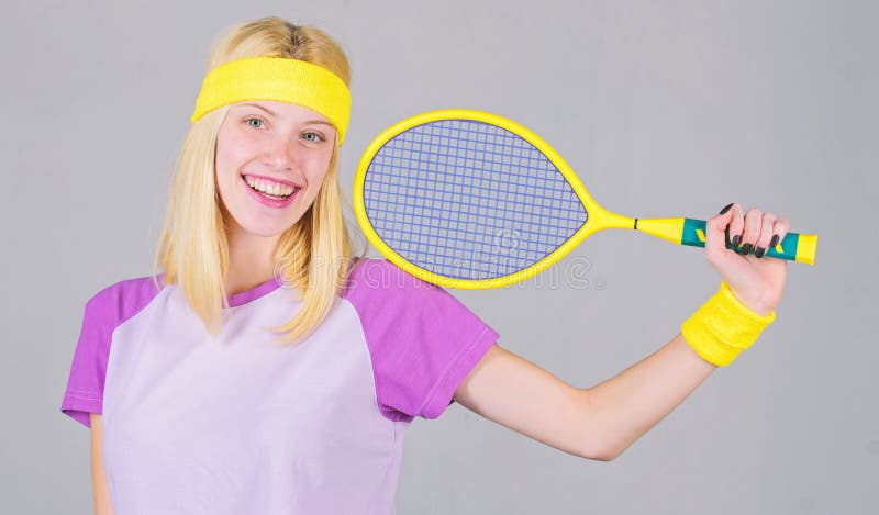 Girl adorable blonde play tennis. Sport for maintaining health. Active leisure and hobby. Athlete hold tennis racket in royalty free stock photography Girl adorable blonde play tennis. Sport for maintaining health. Active leisure and hobby. Athlete hold tennis racket in royalty free stock photography