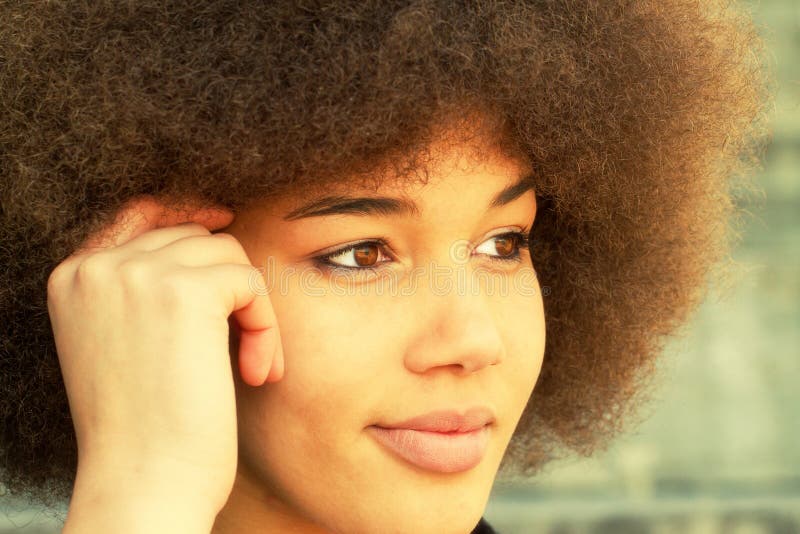 Girl with afro hair cut