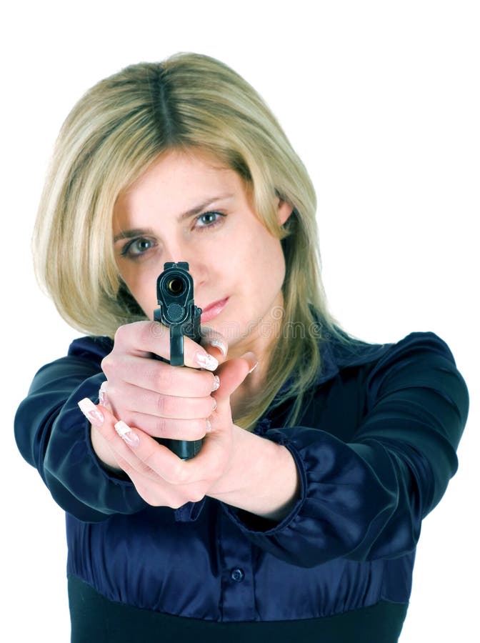Beautiful blond girl aiming a gun at camera