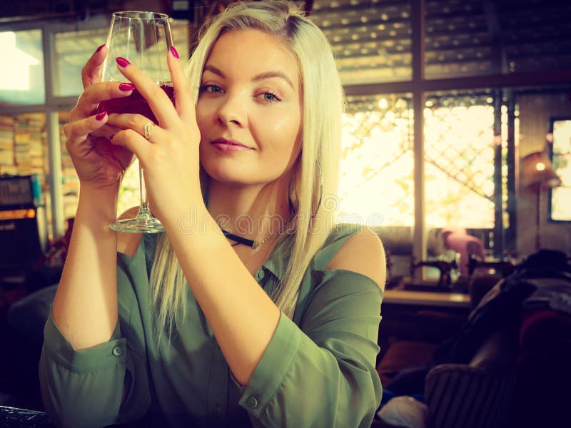 Girl with alcohol glass in pub club royalty free stock photos Girl with alcohol glass in pub club royalty free stock photos