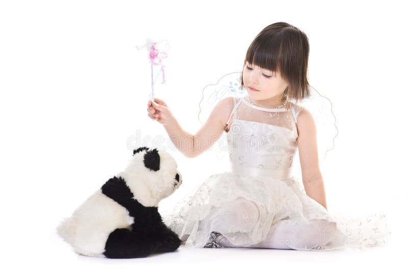 Girl with angel wings casting spell on a panda