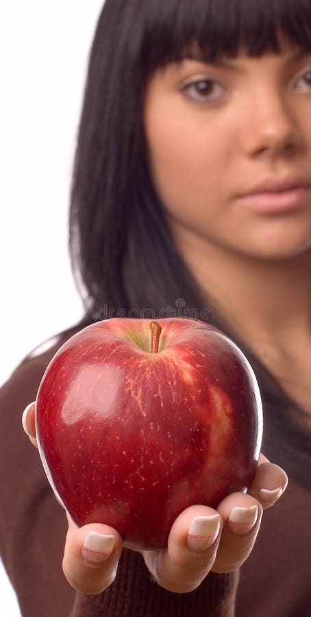 The girl with an apple stock images