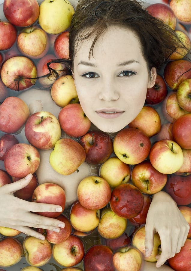 Girl in apples