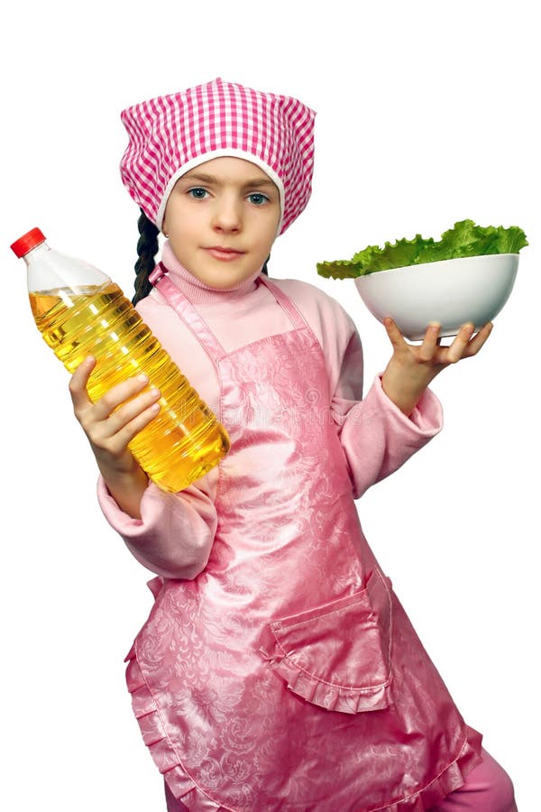 Girl apron with the dish of lettuce