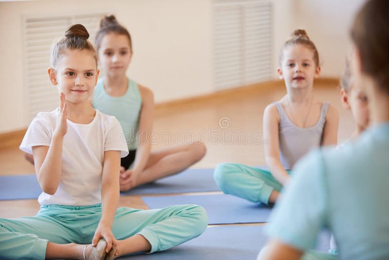 Girl Asking Question in Class royalty free stock photo