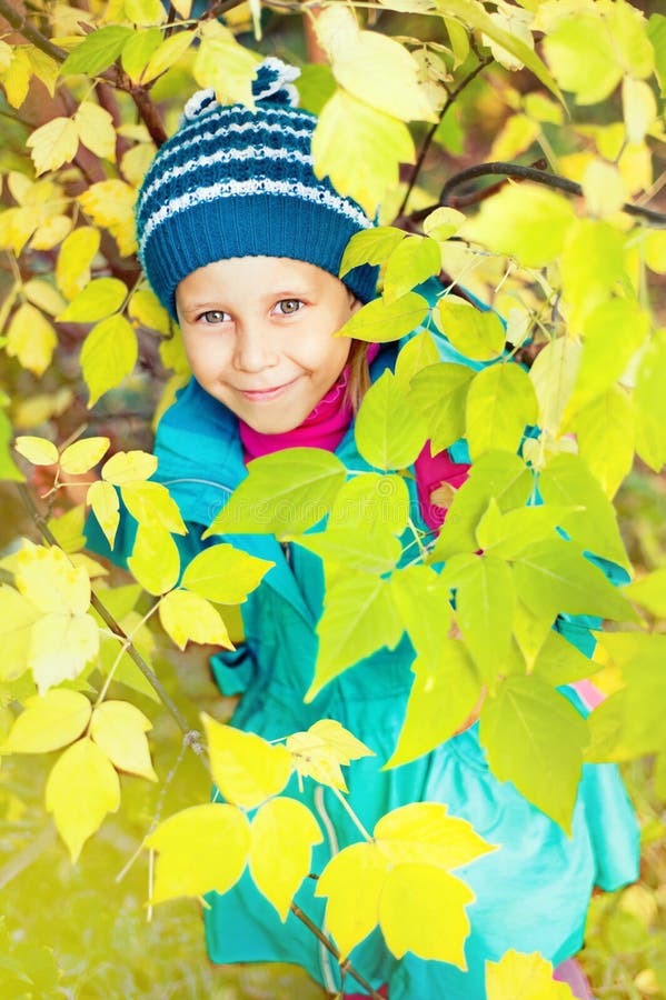 Girl in autumn forest royalty free stock images