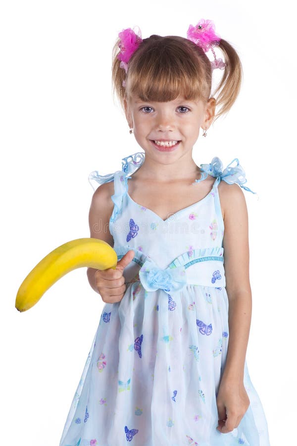 A girl in with a banana