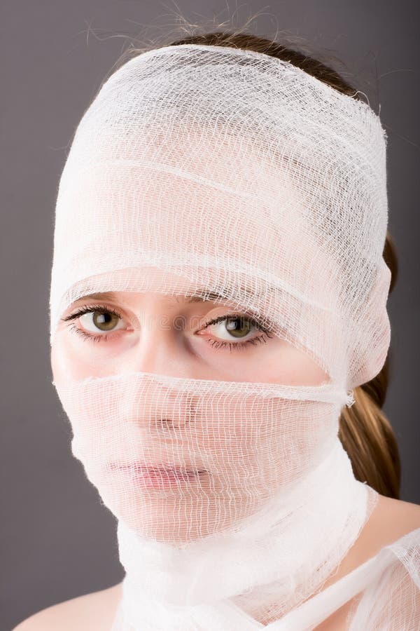 Girl with bandages stock photo