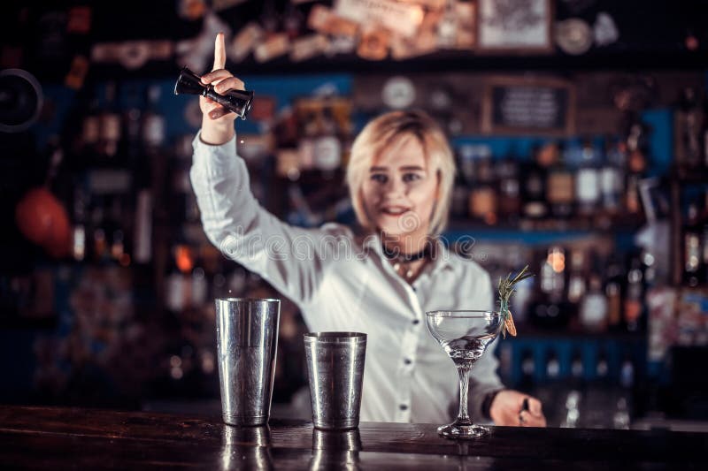 Girl Bartender Mixes a Cocktail at the Bar Stock Photo - Image of ...