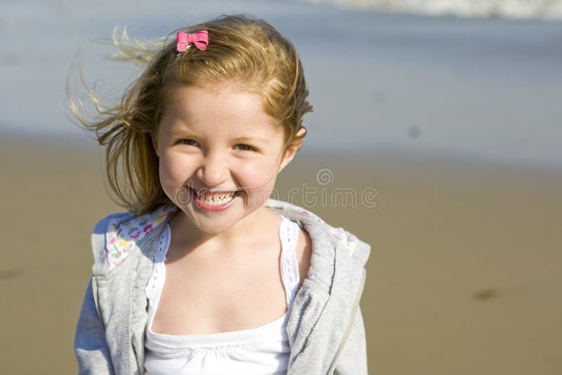 Girl at the beach stock image. Image of laugh, hands - 10656335