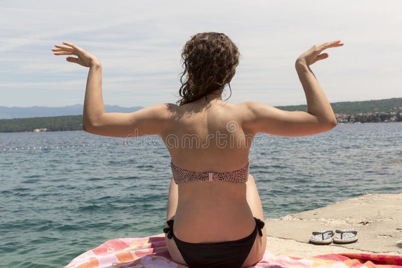 Nude babes are having some good time on the beach