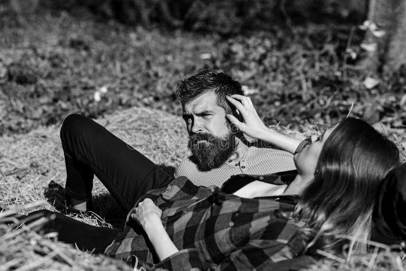 Girl and bearded guy or happy lovers on a date stock photo Girl and bearded guy or happy lovers on a date stock photo