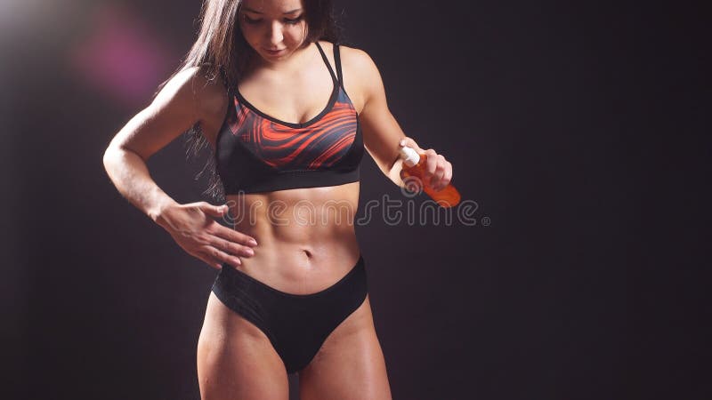 Body with and muscular cute bodybuilder toned female 