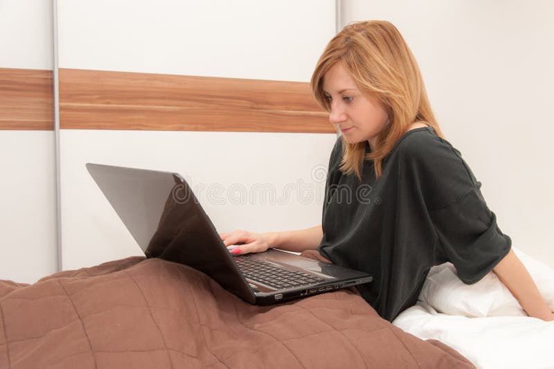 Girl in Bed with Laptop stock photo. Image of woman, work 35417452