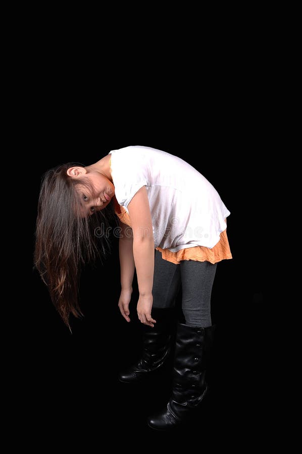 Girl bending over. stock photo. Image of casual, young 18716260