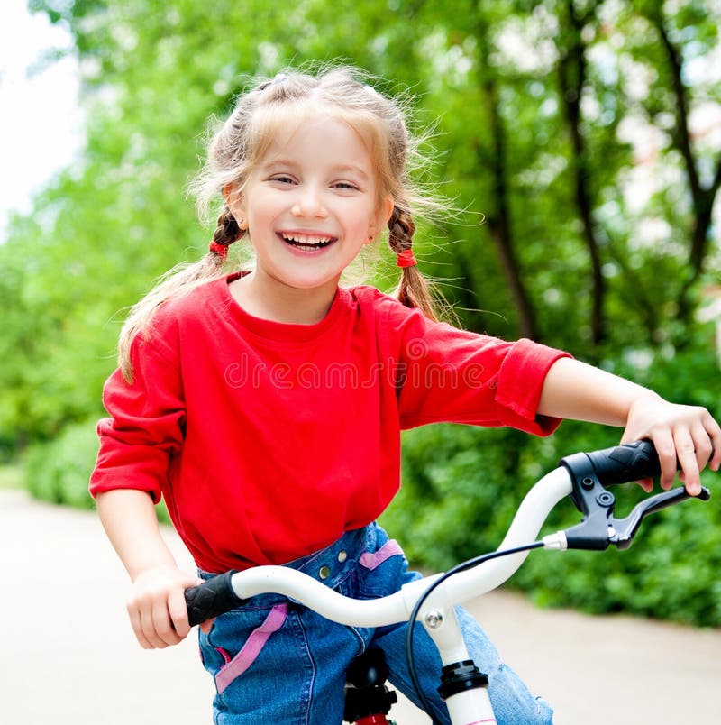 Girl with bicycle