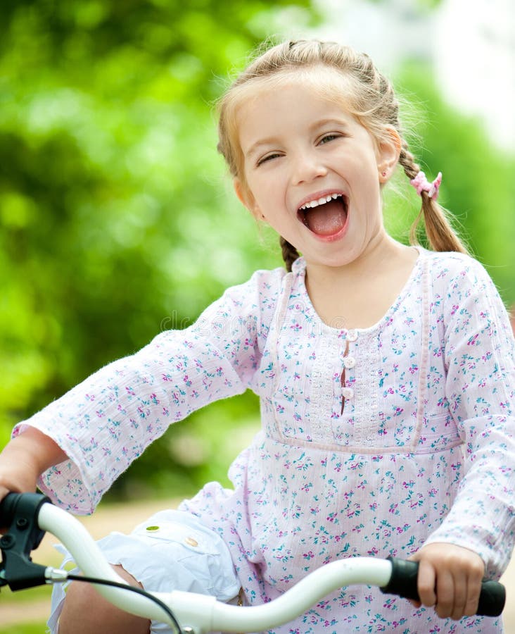 Girl with bicycle