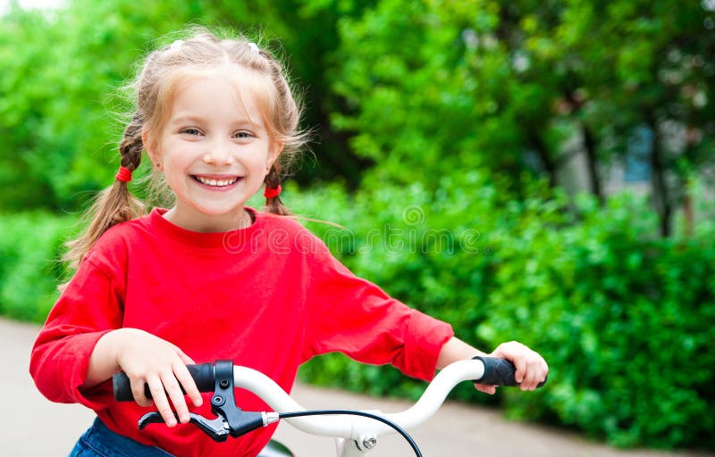 Girl with bicycle
