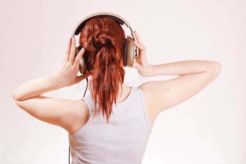 Girl with big headphones stock image. Image of slim, hand 9250259
