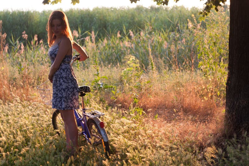 Girl and bike royalty free stock photo Girl and bike royalty free stock photo