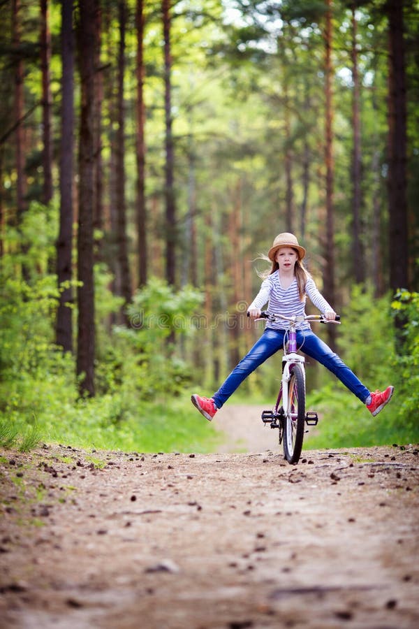 Girl on the bike stock image. Image of bike, springtime 130975075