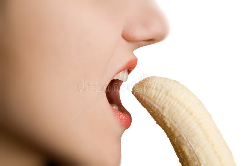 Girl biting a banana