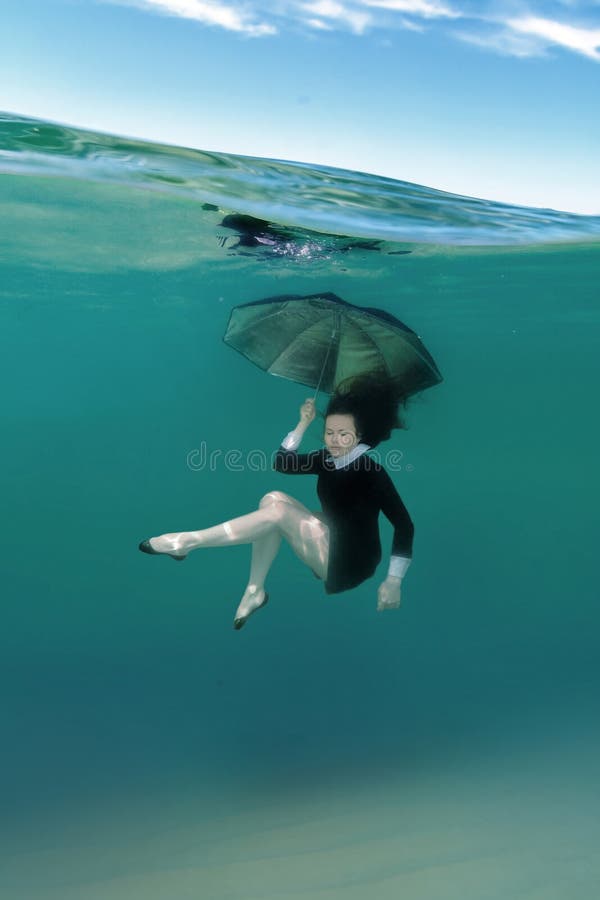 Girl in Black Dress Underwater Stock Image - Image of action, brunette ...