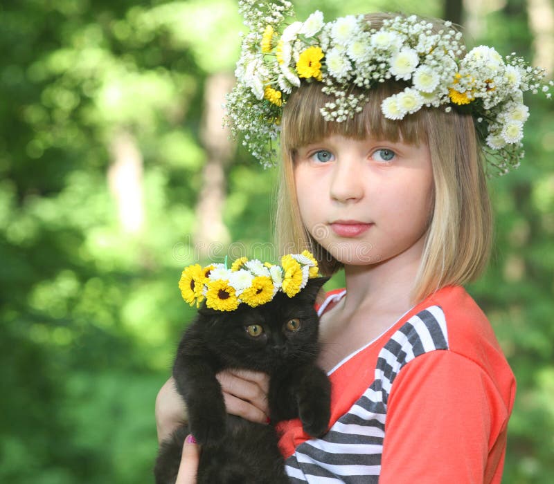 The girl with a black kitten.