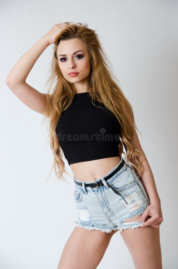 Girl with Black Top and Jeans Shorts Stock Image - Image of person ...