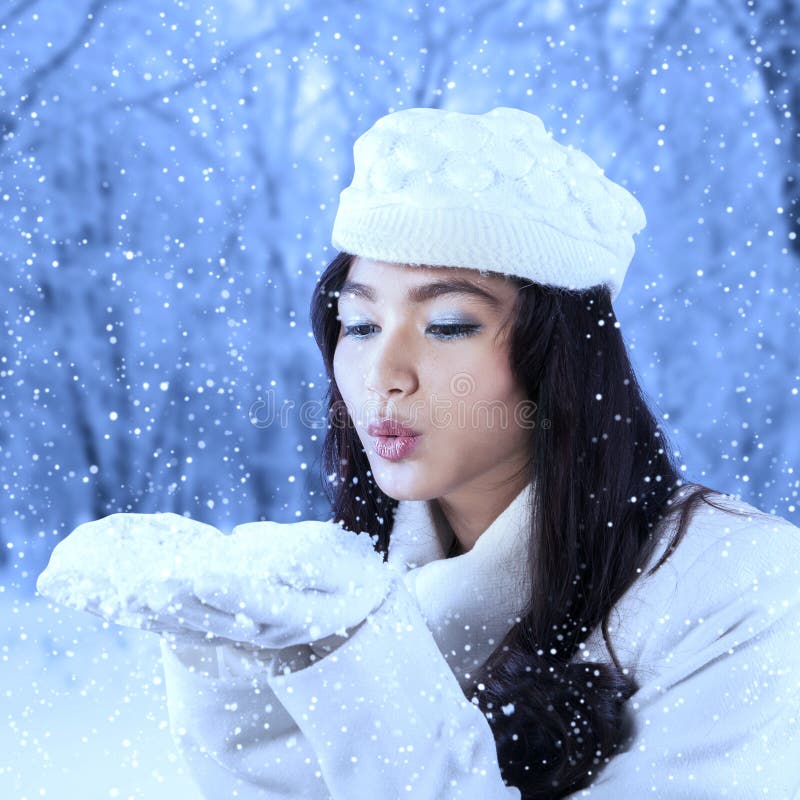 Girl blowing snow outdoor stock image. Image of blowing - 46344827