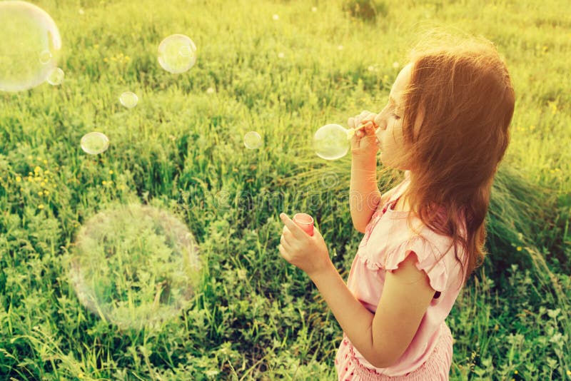 Blowing Bubbles stock image. Image of nature, childhood - 14390049