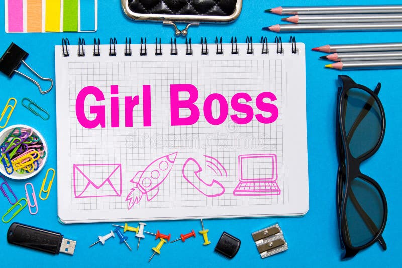 Girl Boss notes in a notebook on the Desk in the office. Business girl concept royalty free stock photo Girl Boss notes in a notebook on the Desk in the office. Business girl concept royalty free stock photo