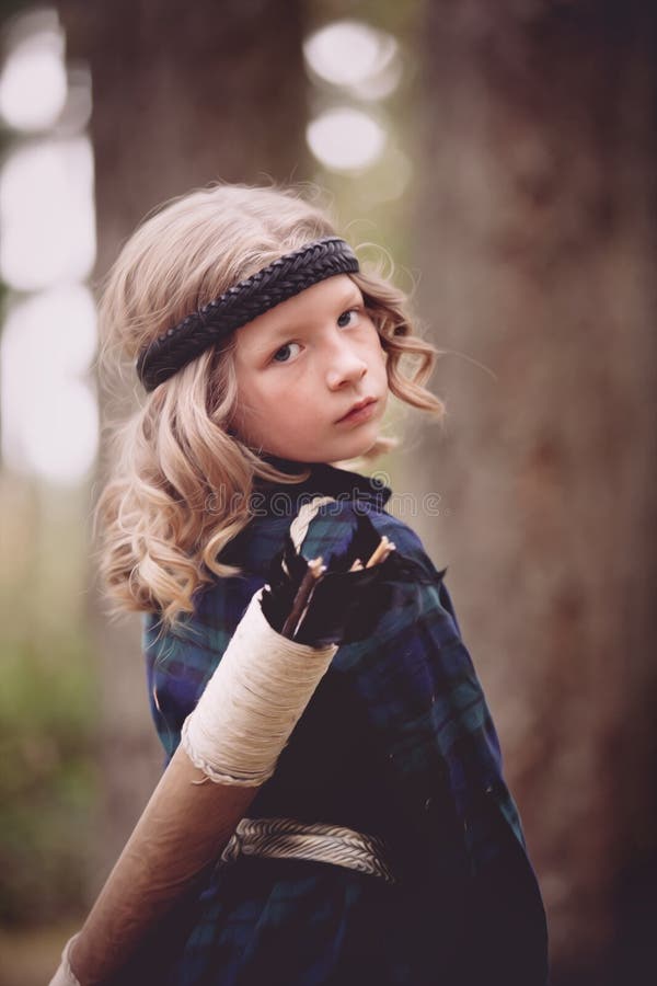 Girl with Bow and Arrows stock photo. Image of white 33441828