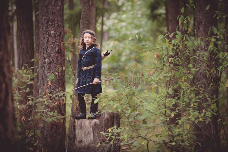 Girl with Bow and Arrows stock photo. Image of white 33441828