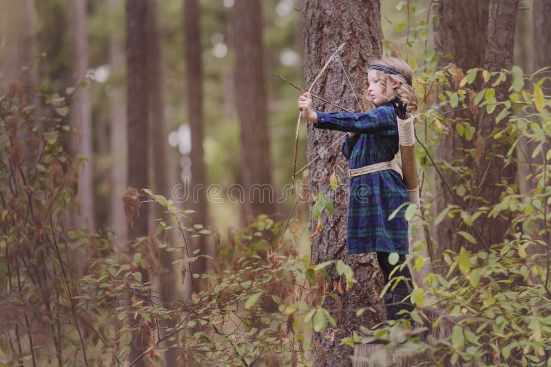 Girl with Bow and Arrows stock image. Image of area, northwest 33441853