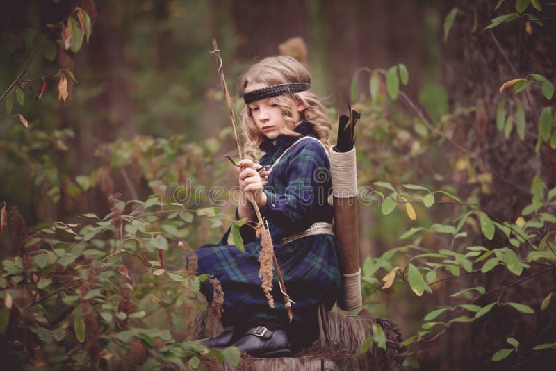 Girl with Bow and Arrows stock image. Image of state 33441875