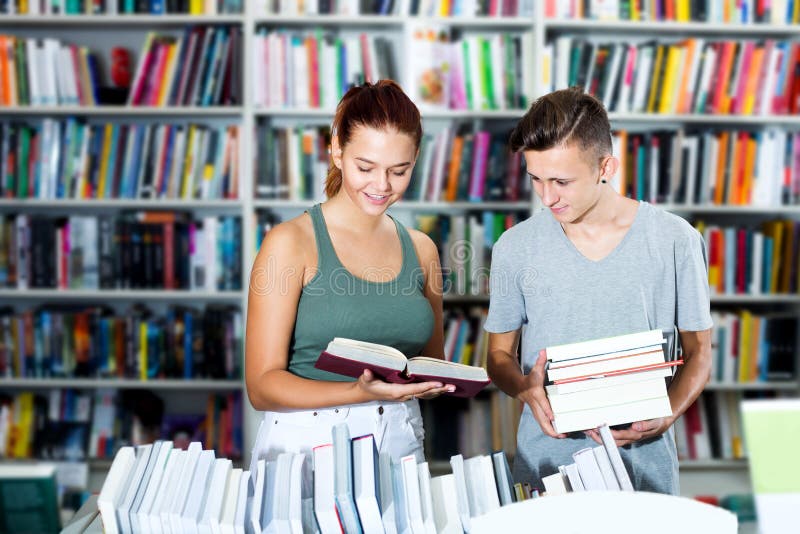 Girl and boy in book store