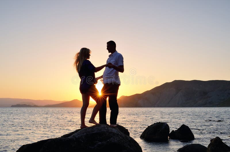 A girl and a boy happily communicate