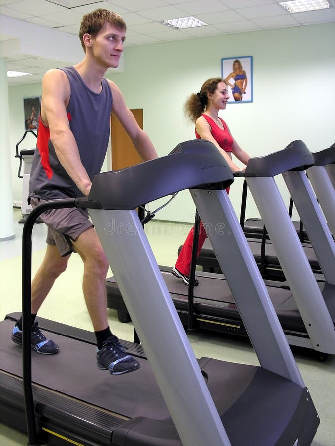 Girl and boy in health club