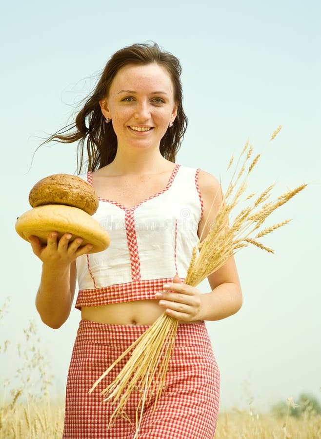 Girl with bread at field stock image. Image of agriculture 15377059
