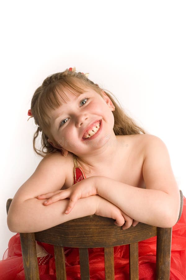 Girl on brown chair