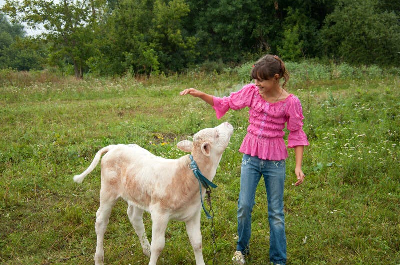 Girl with a calf