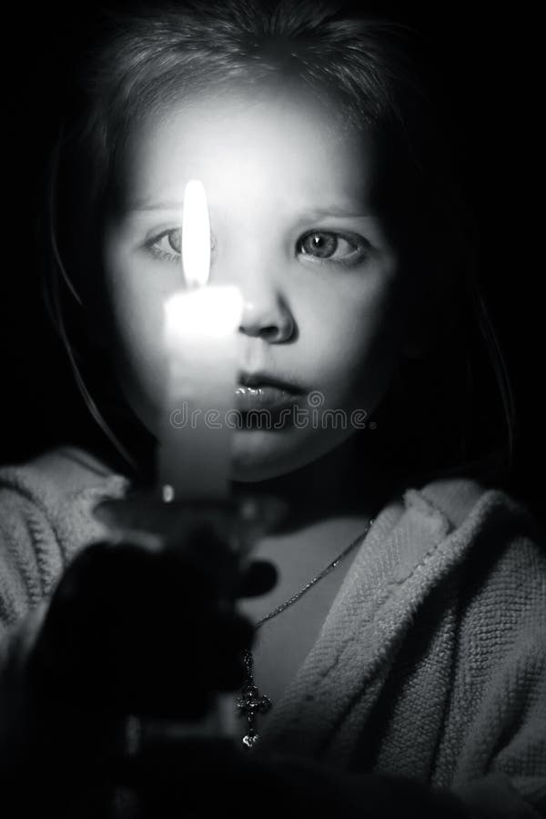 Girl with candle stock image. Image of girl, church, cult 8979613