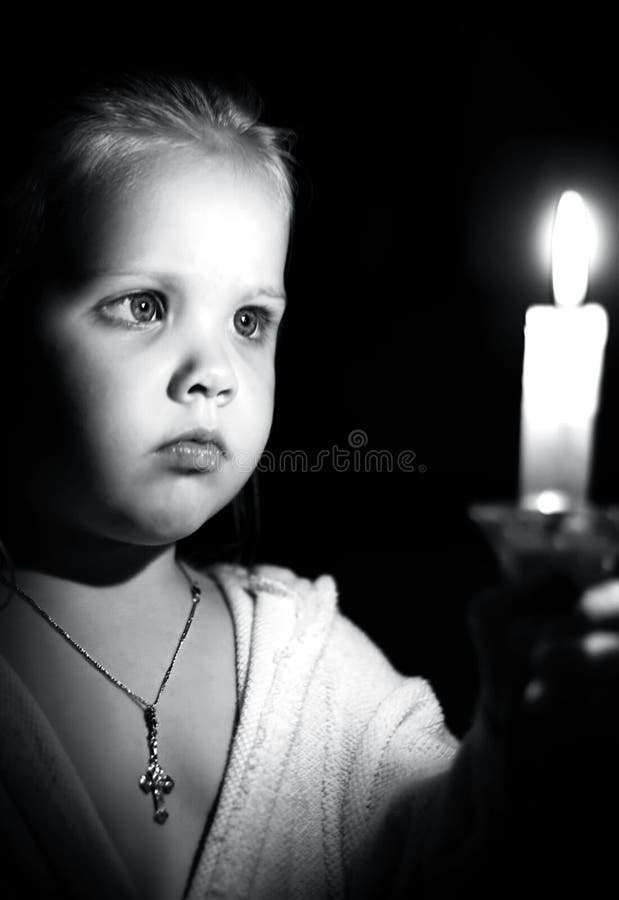 Girl with a candle stock photo. Image of household, holidays 48188196