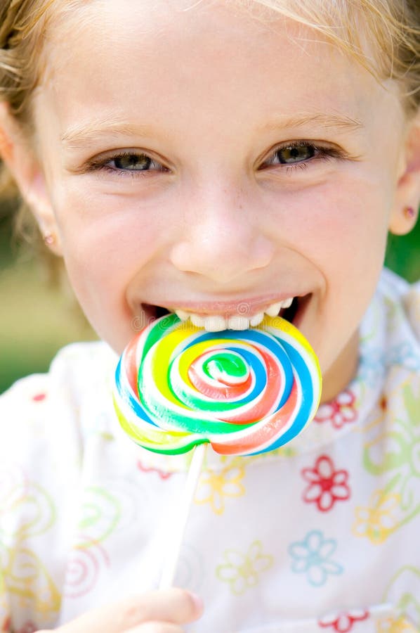 Girl with candy stock photo. Image of human, girls, enjoyment 26111206