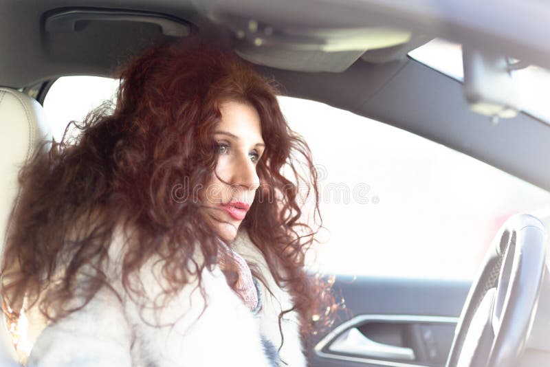 Girl in car royalty free stock photo