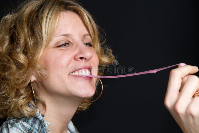 Girl with chewing gum stock image. Image of clothing 17864111