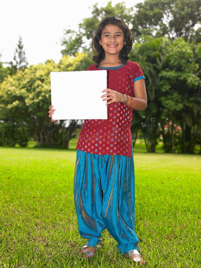 Girl child with blank placard