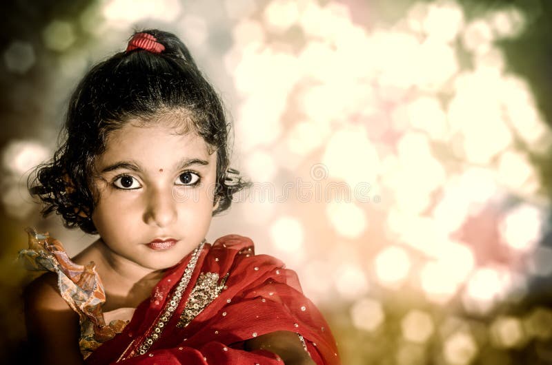 Girl child bride in red saree