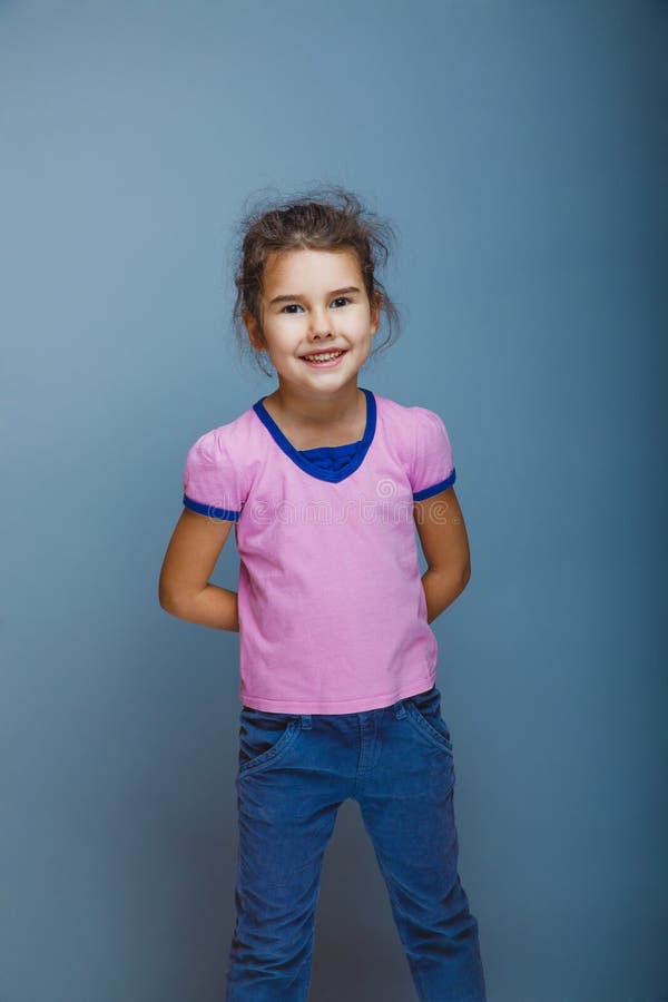 Girl Child Standing Clasped Her Hands Behind Back Stock Photos - Free ...
